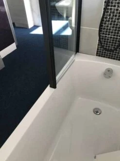 Roman Lumin8 Pivoting Bath Screen - Matt Black Frame -Lumibath Shop Lumin8 Pivoting Bath Screen Image 2